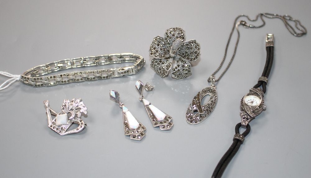 Six assorted items of marcasite jewellery including a pair of earrings, ring, brooch, bracelet and a Gianni Vecci ladys watch.